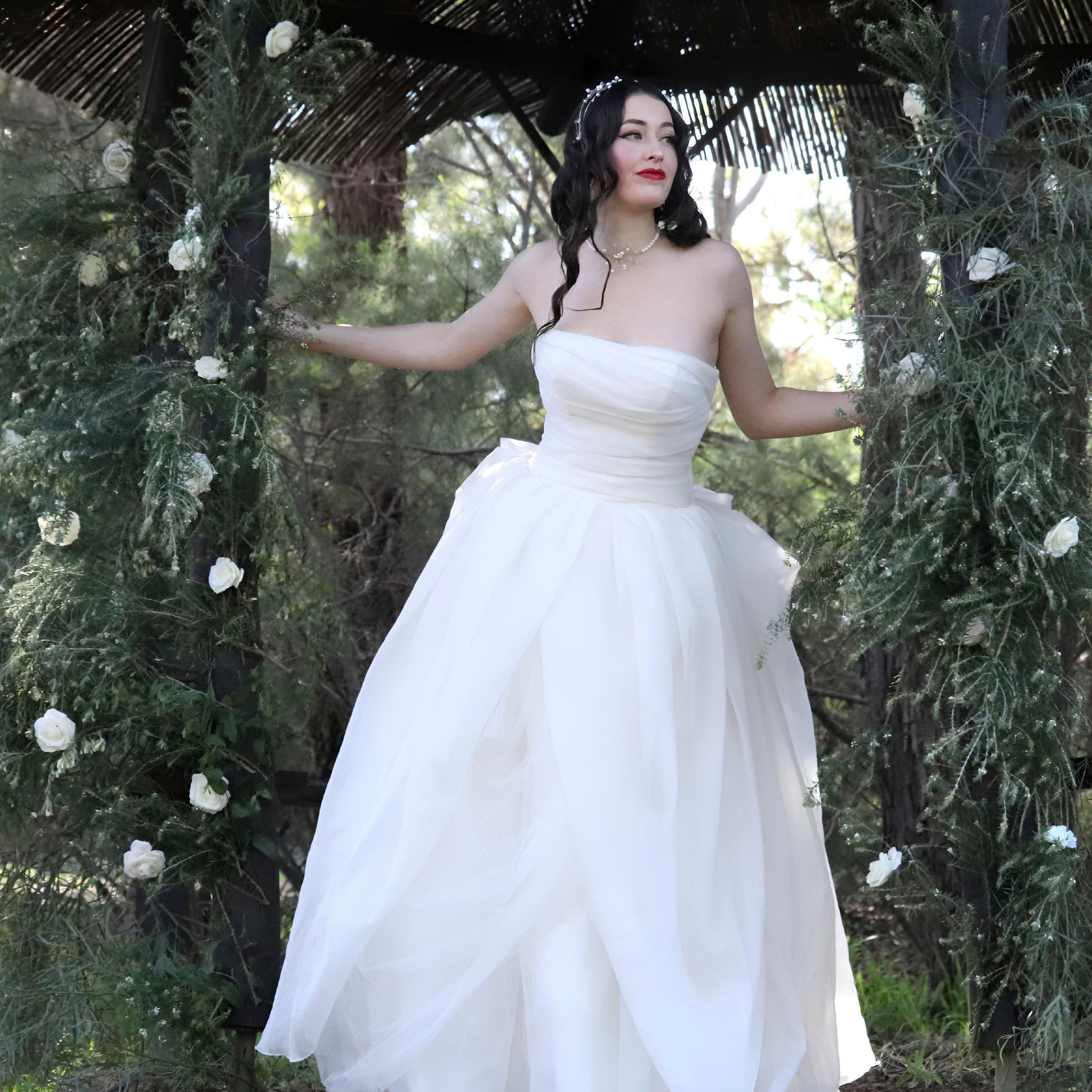 Silky soft delicate work of art. Finely boned bodice, with a full bodied beautifully layered flowing romantic buttery soft skirt. A sensational silky showstopper by Vera Wang.