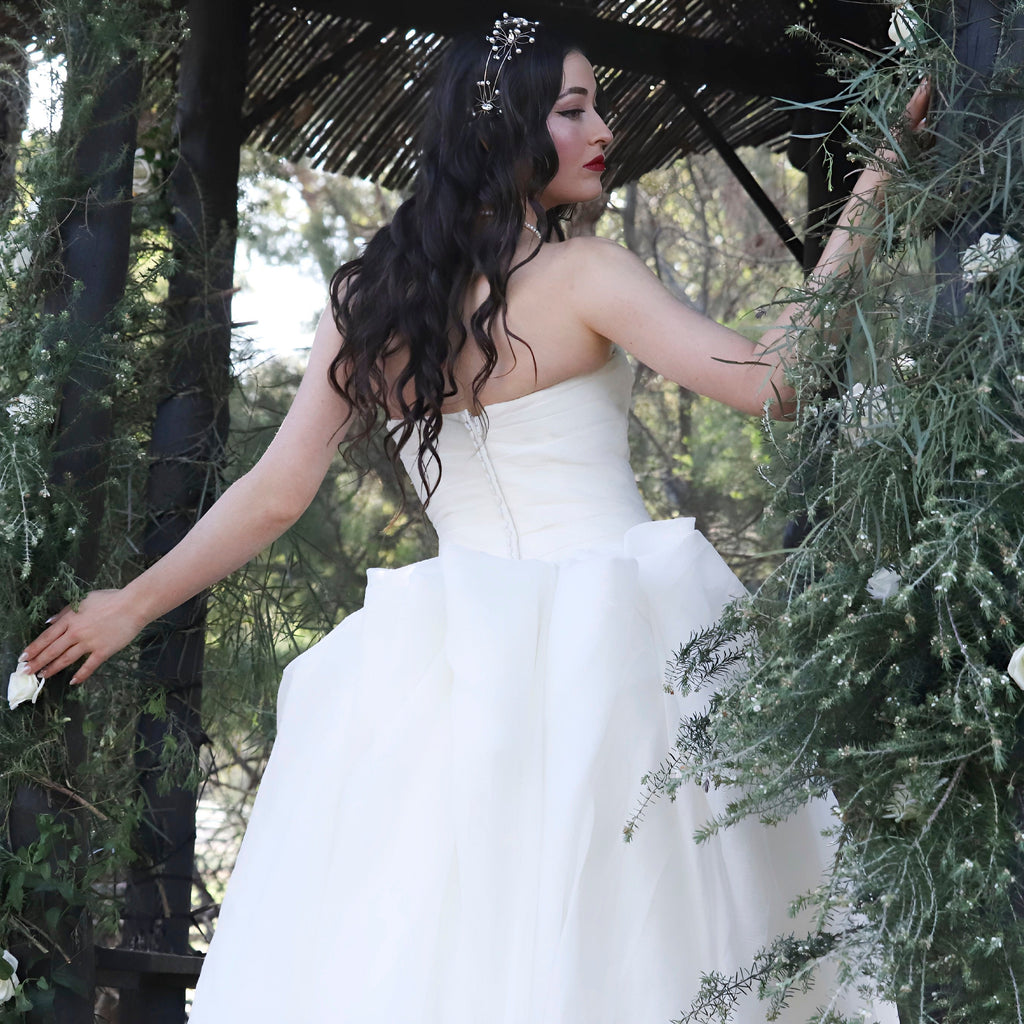 Silky soft delicate work of art. Finely boned bodice, with a full bodied beautifully layered flowing romantic buttery soft skirt. A sensational silky showstopper by Vera Wang.