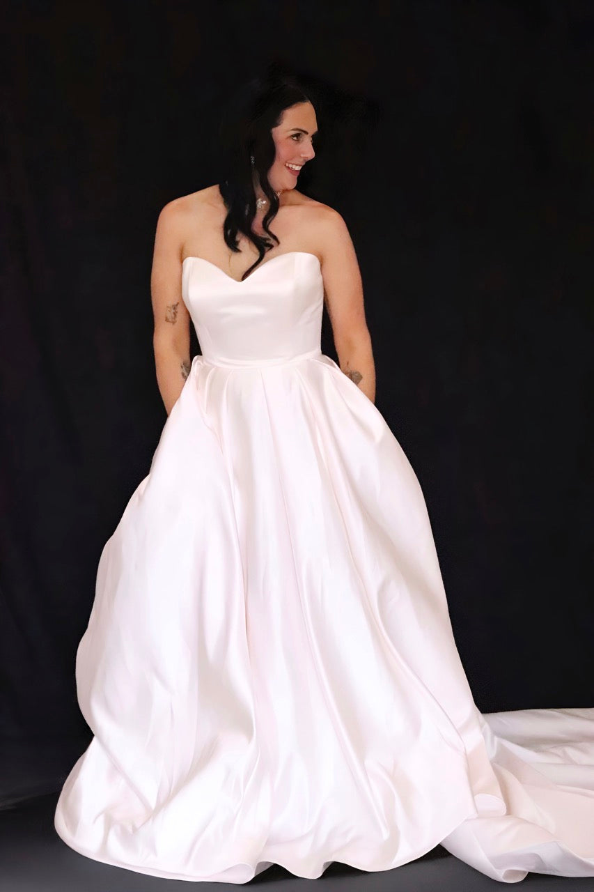 Mia Solano wedding dress hire Perth – sweetheart strapless finely boned bodice with full-bodied romantic skirt and hidden pockets, fits AU8-10