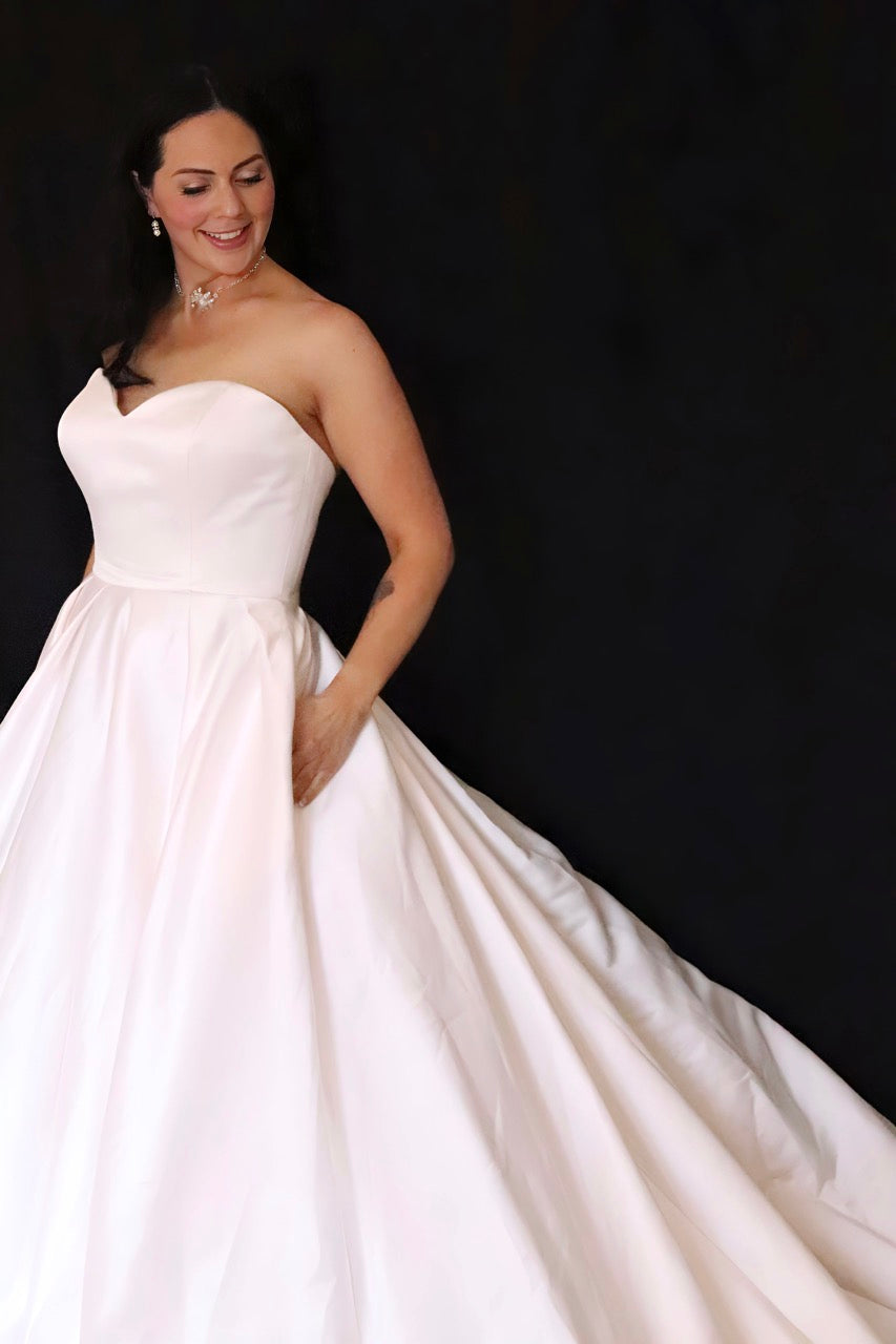 Mia Solano wedding dress hire Perth – sweetheart strapless finely boned bodice with full-bodied romantic skirt and hidden pockets, fits AU8-10