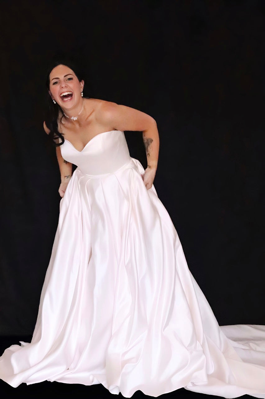 Mia Solano wedding dress hire Perth – sweetheart strapless finely boned bodice with full-bodied romantic skirt and hidden pockets, fits AU8-10