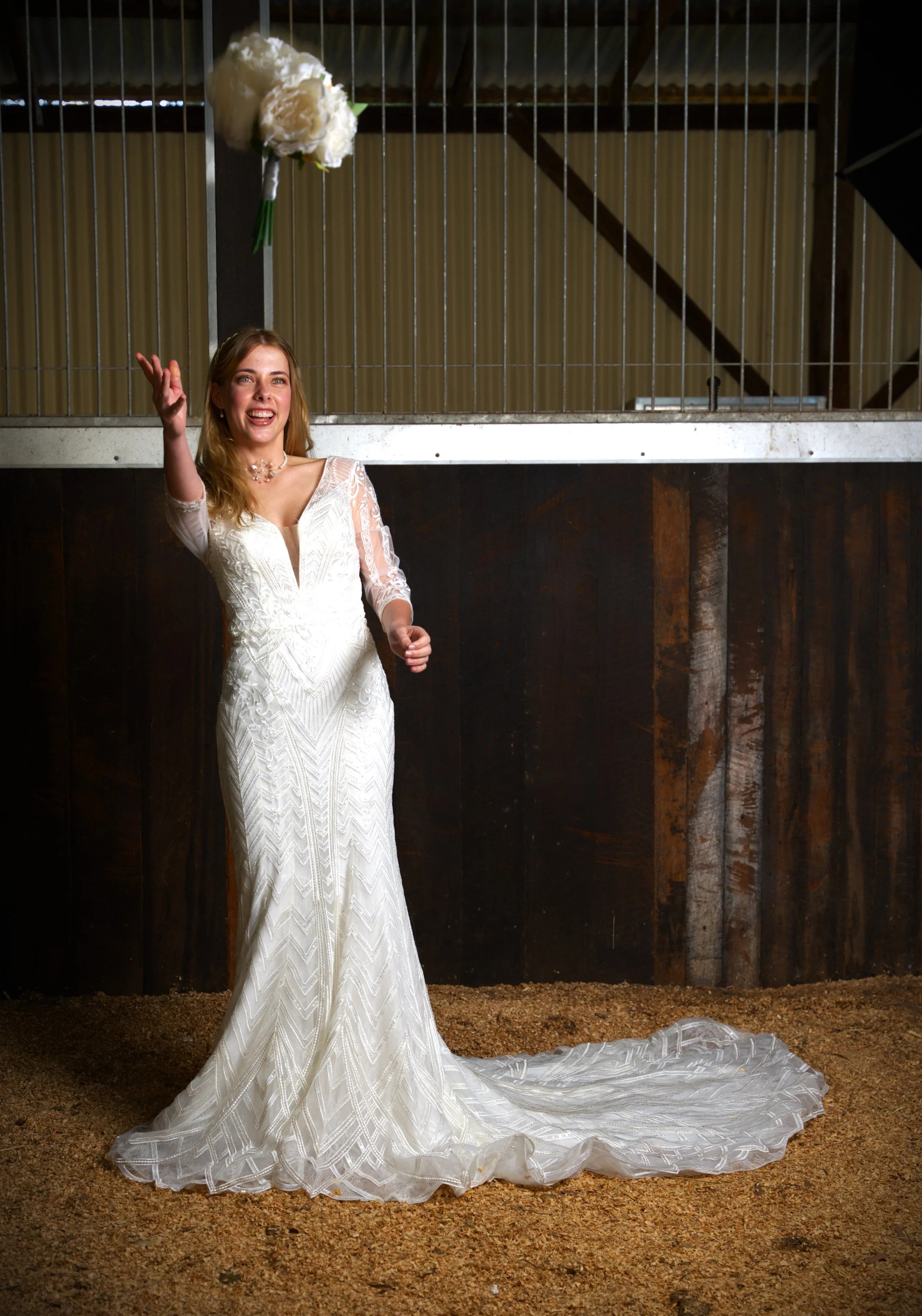 Art Deco wedding dress hire Perth – meticulously hand beaded geometric bodice, finely boned with soft detailed sleeves, fitted skirt, fits AU6-8