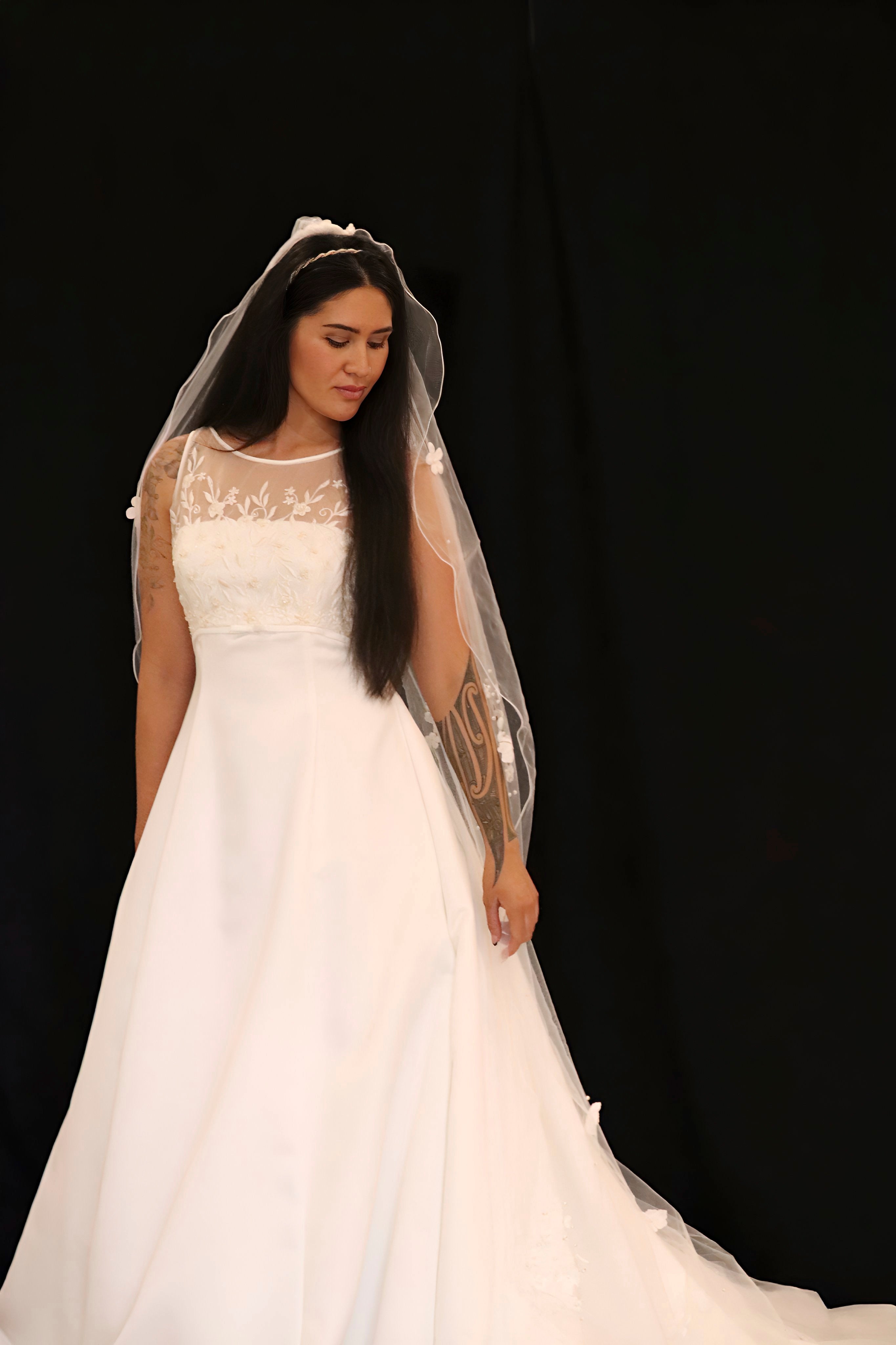 Wedding dress hire Perth with overlayed high neck soft tulle bodice, floral details, and luxurious Mikado A-line skirt, fits AU12-14